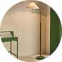 A Habitat Wiggle and taper floor lamp in green and white.