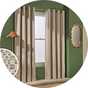 Grey Habitat blackout Jacquard eyelet curtains in a living room.