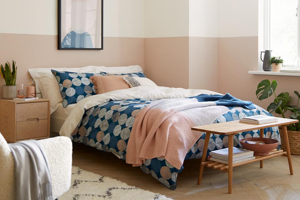 Blue and pink polka dot bedding.