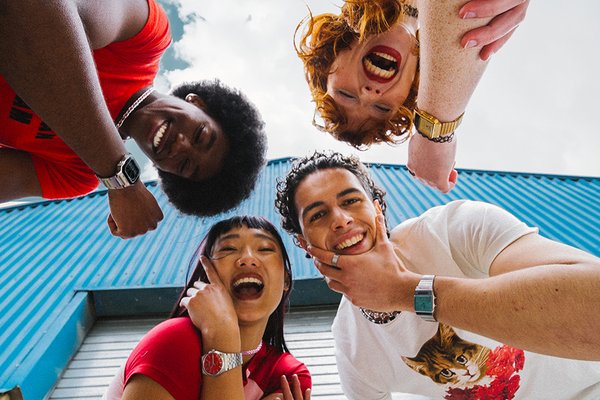 A self potrait of a group of four friends wearing Casio watches.