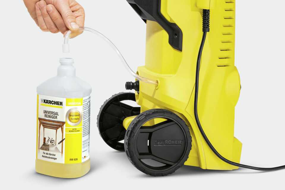 A close up image of Karcher K2 Power Control Home Pressure Washer - 1400W being filled with detergent.