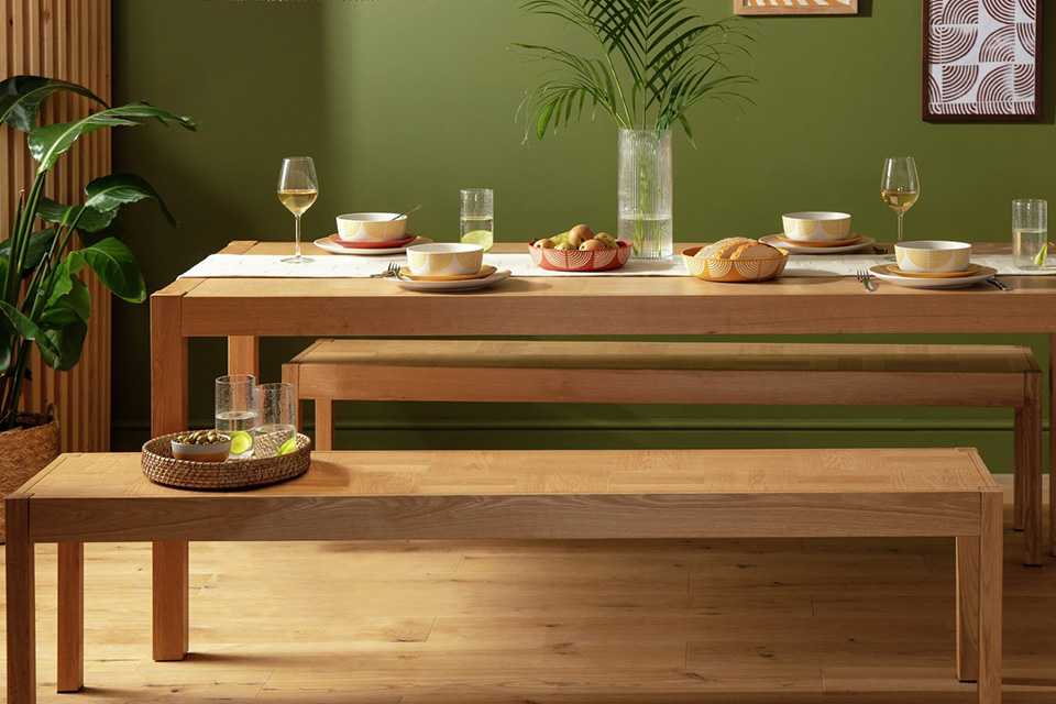 A solid wood dining bench.