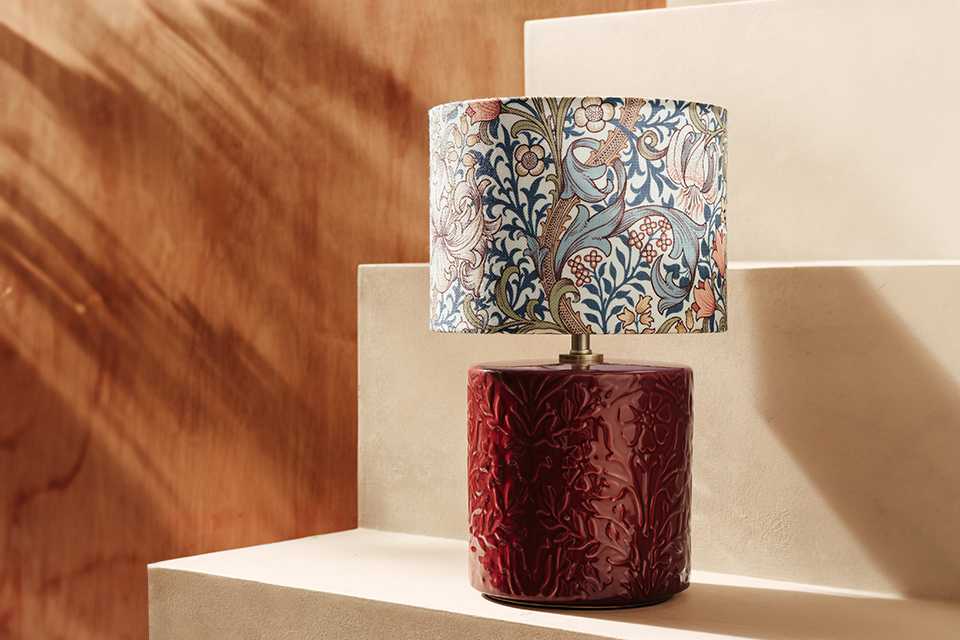 Morris and co red base floral embossed lamp with blue floral lamp shade.