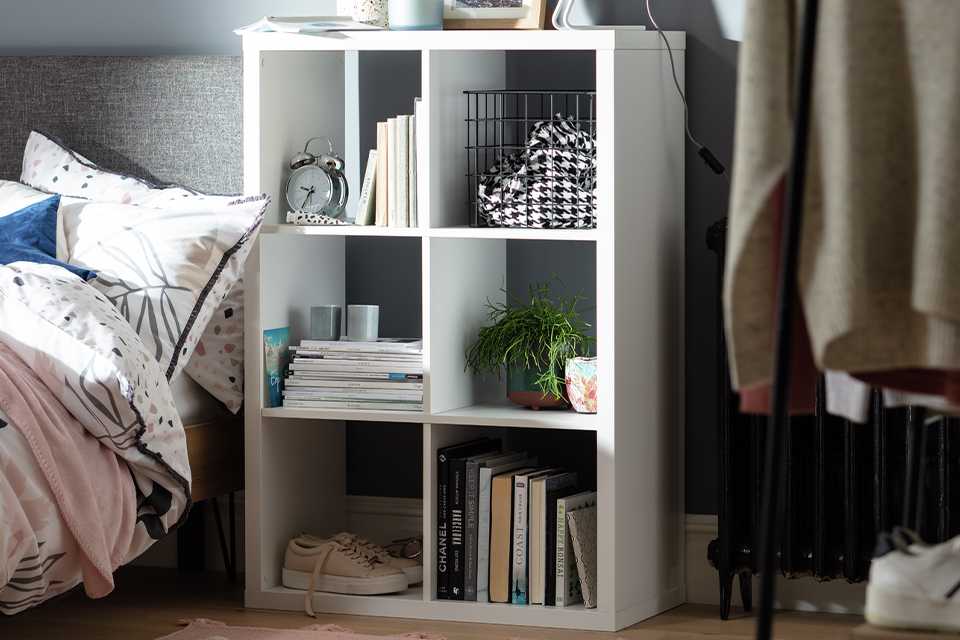 Habitat square shelves and cube storage units in a bedroom.