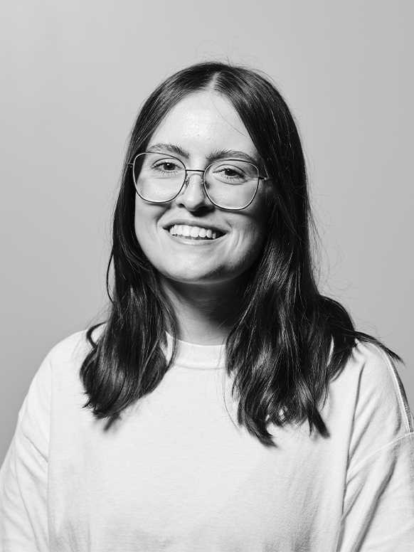 A monochrome portrait of artist Holly Light.