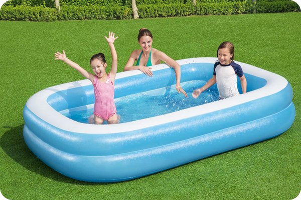 A mother playing with her kids in a Bestway rectangular 9ft paddling pool.