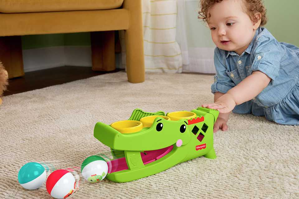 Fisher-Price Sit & Tap Rolligator, Pounding Activity Toy for Baby Crawling Play.