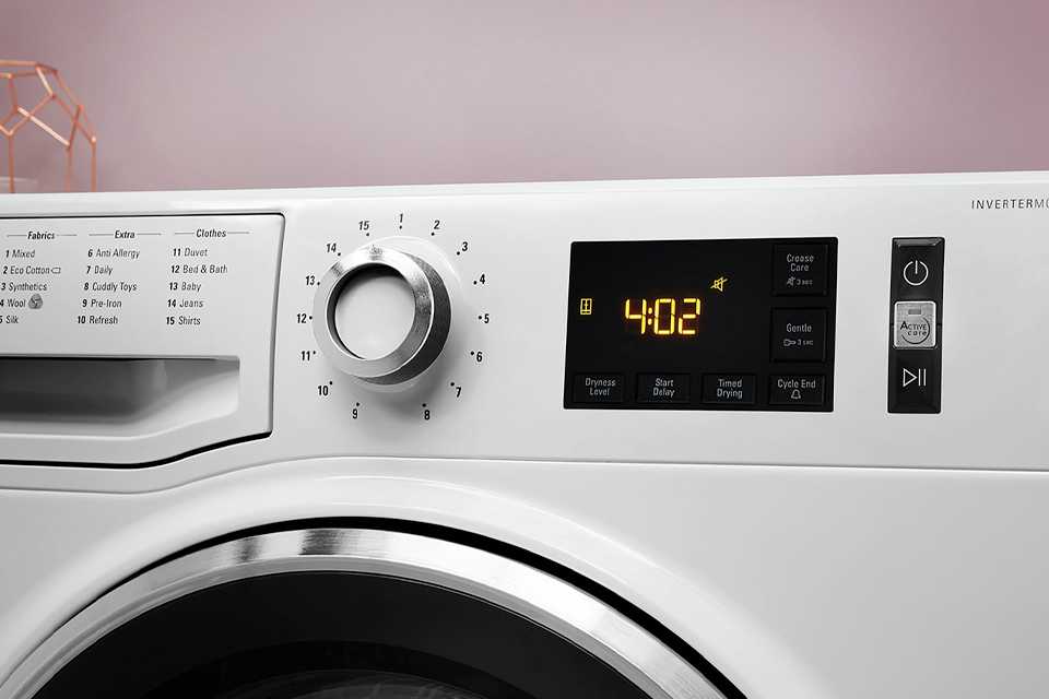 Hotpoint NTM1182XB 8KG Heat Pump Tumble Dryer in white.