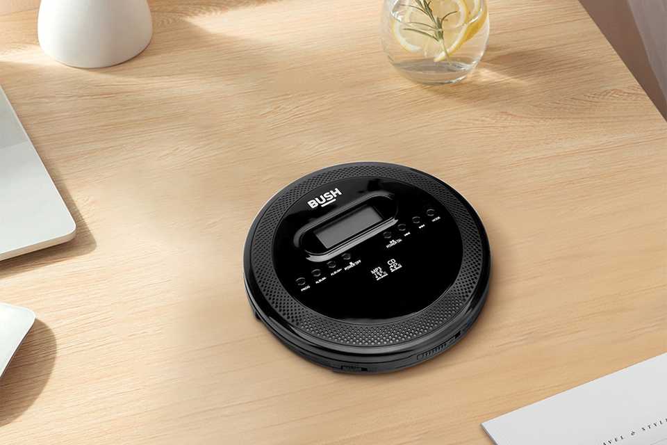 Bush CD player with MP3 playback on a wooden table.