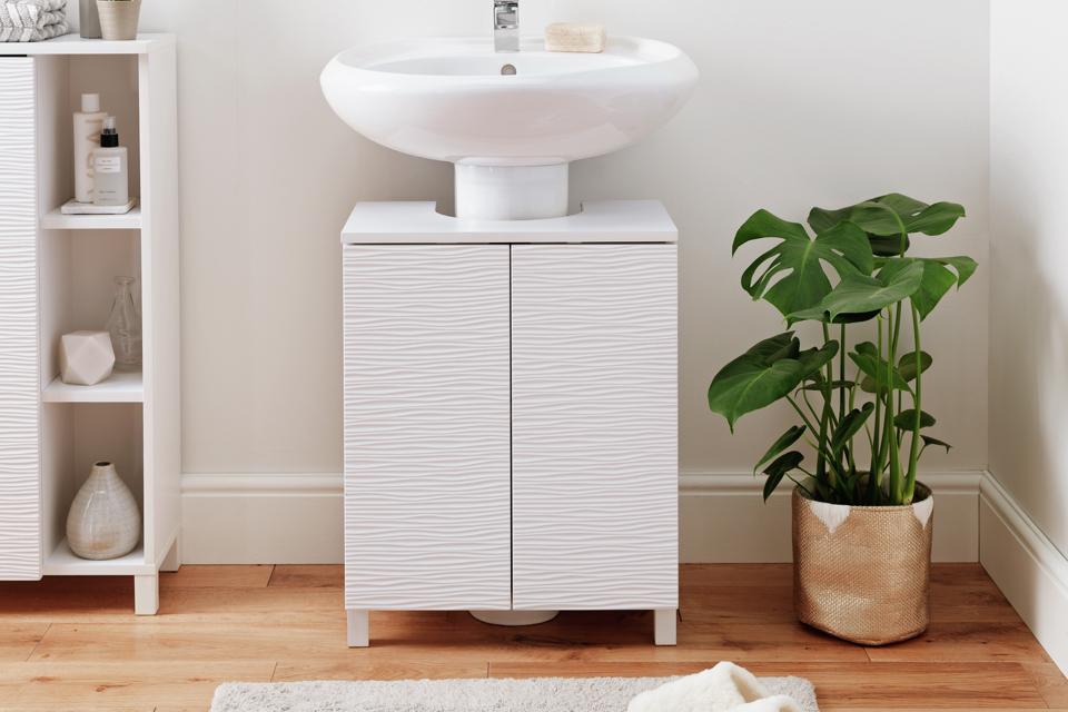 3. Use the space beneath the sink.