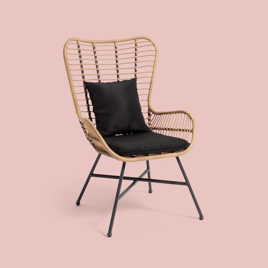 Wooden bamboo chair with black legs and seat cushions.