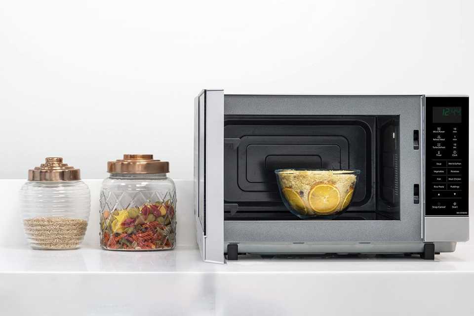 Panasonic 1000W Standard Flatbed Microwave NN-SF464M in silver finish.