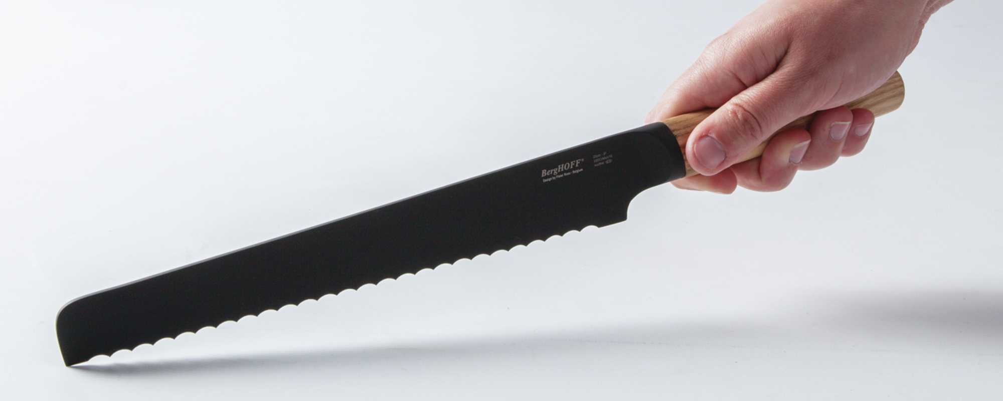 A hand holding a knife.