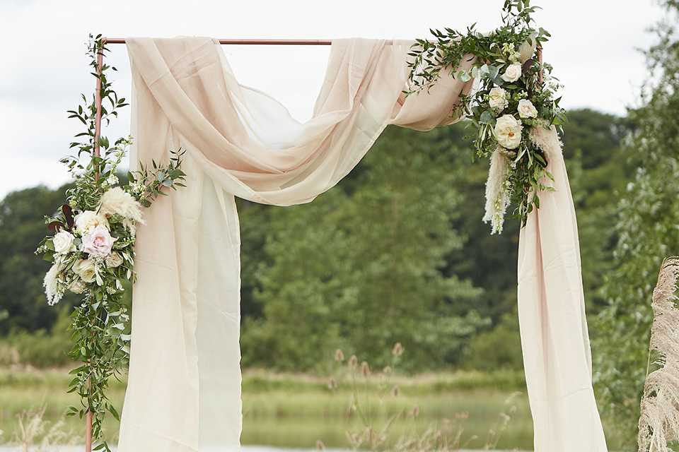 Ginger Ray Draping Taupe set up in outdoors.