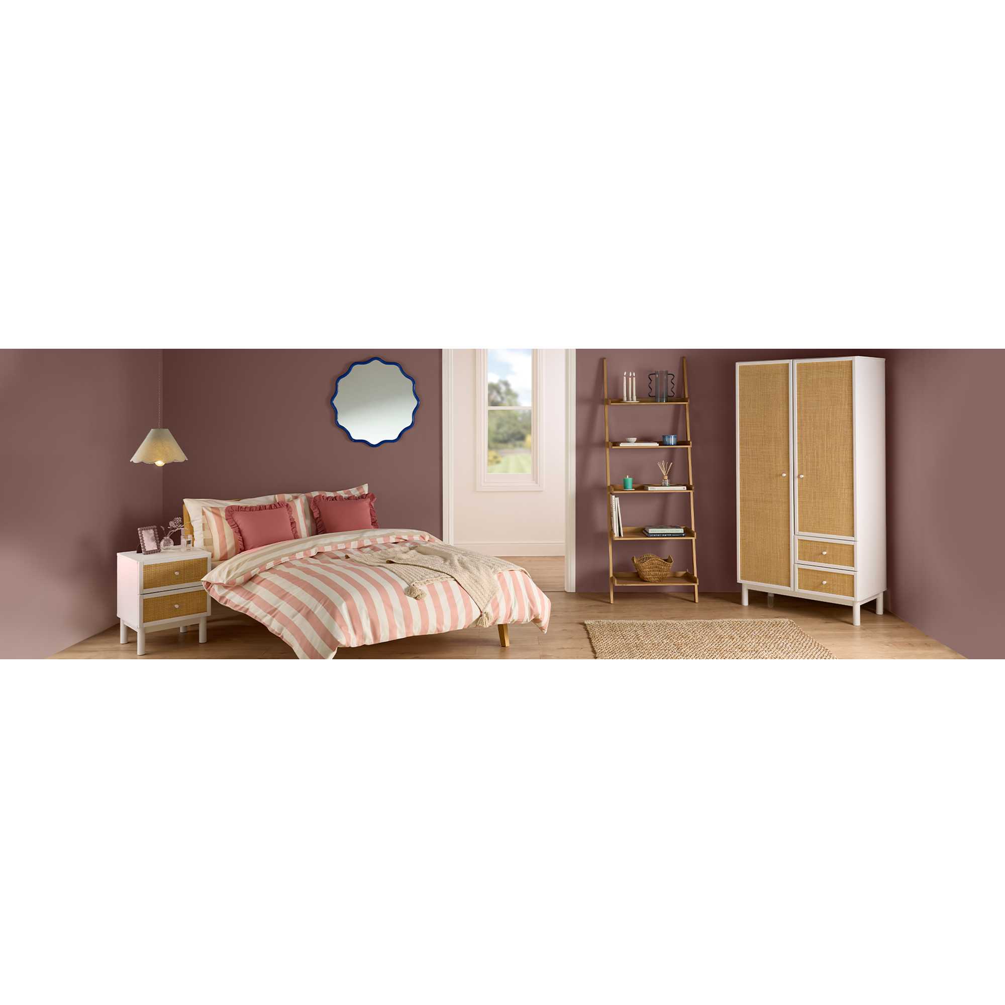 Bedroom with bright and bold coloured furniture and accessories to create a fun scandi setting.