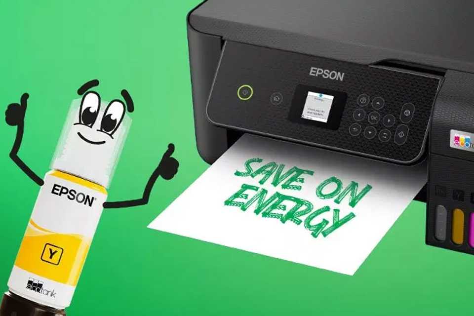 Save on energy written in green on a white paper being printed out of Epson printer.