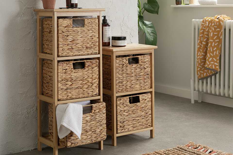 2 cube storage units in a bathroom.