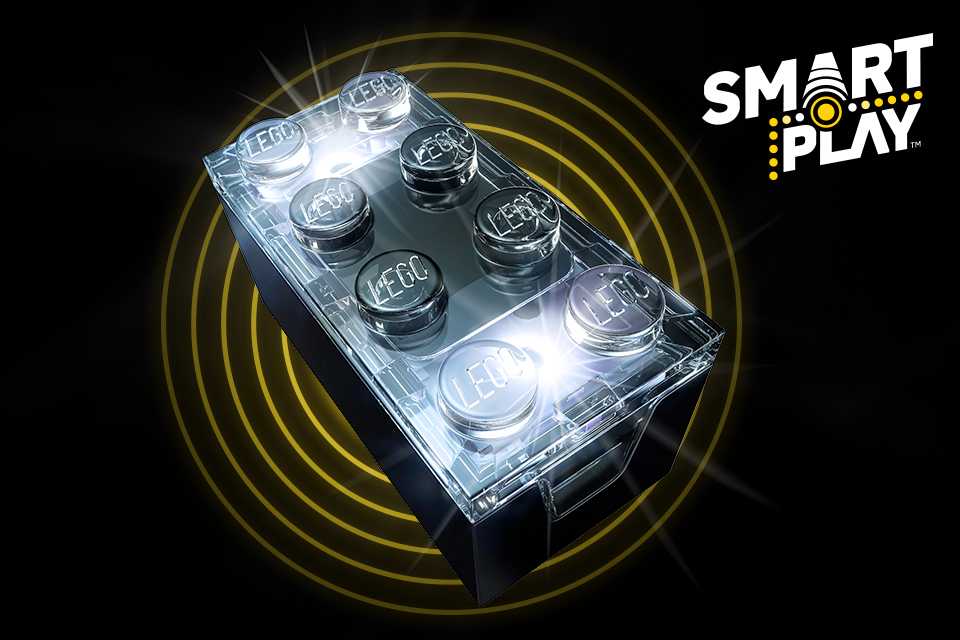 LEGO® SMART Play brick on a black background with yellow circles and the SMART Play logo.