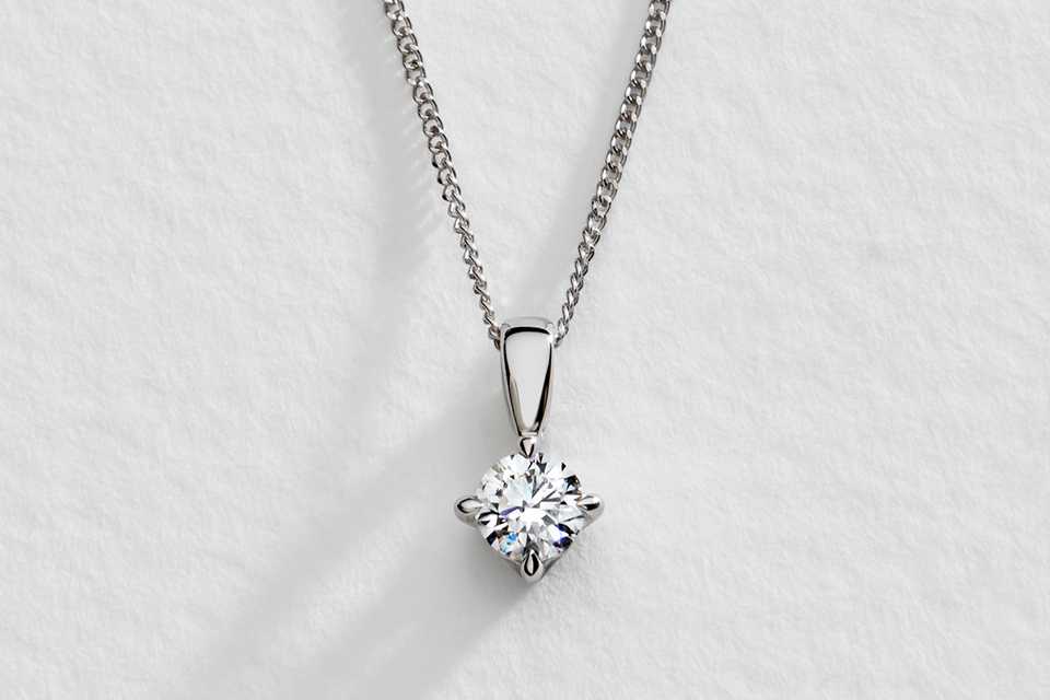 A Pure Brilliance diamond pendant necklace.