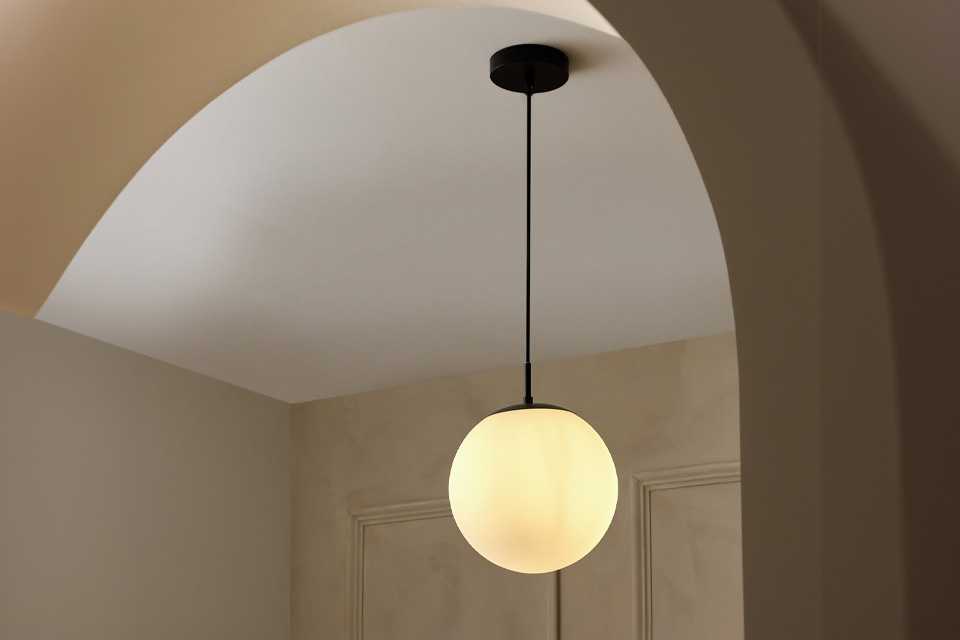 A Habitat black Habitat Boyd glass pendant light.