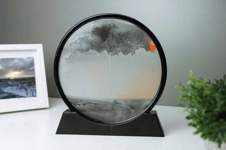 A Menkind InGenious Sand Art Circular Sandscape.