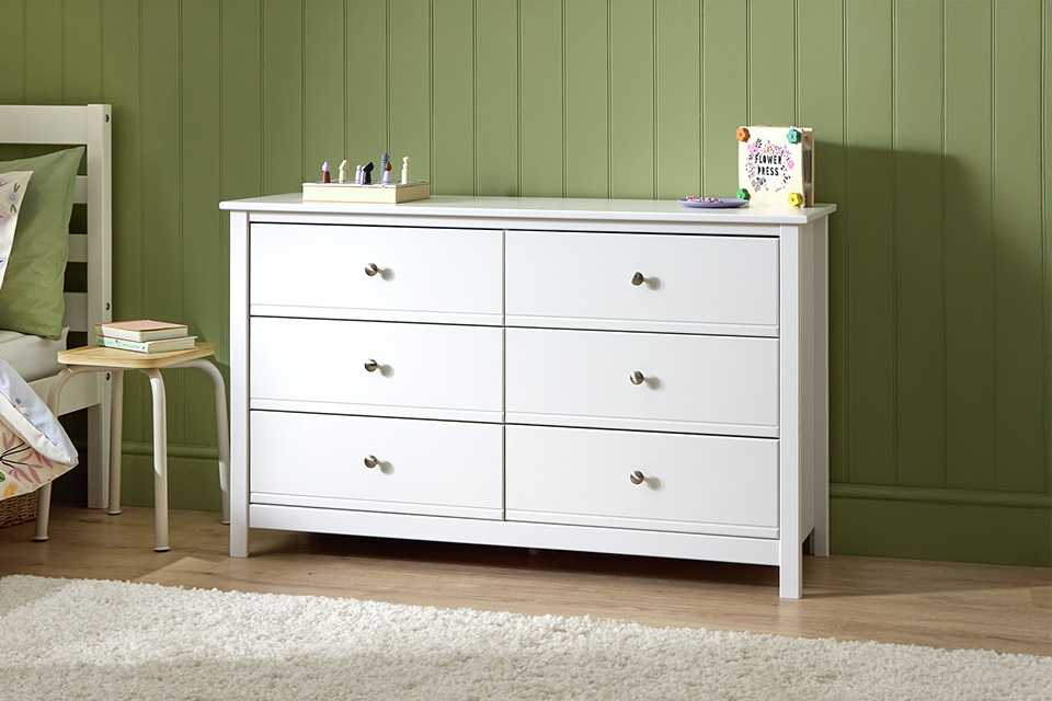 A Habitat Brooklyn kids' chest in white in a child's room.