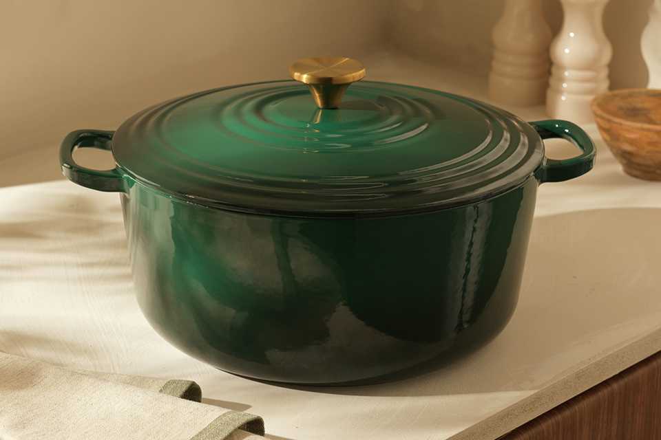 Habitat 6.7L Cast Iron Green Casserole Dish in green colour.