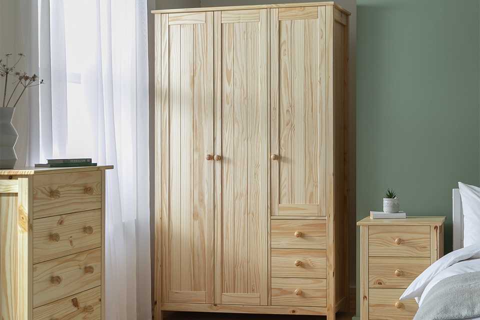 Argos Home Scandinavia 3 Piece 3 Door Wardrobe Set in pine finish.