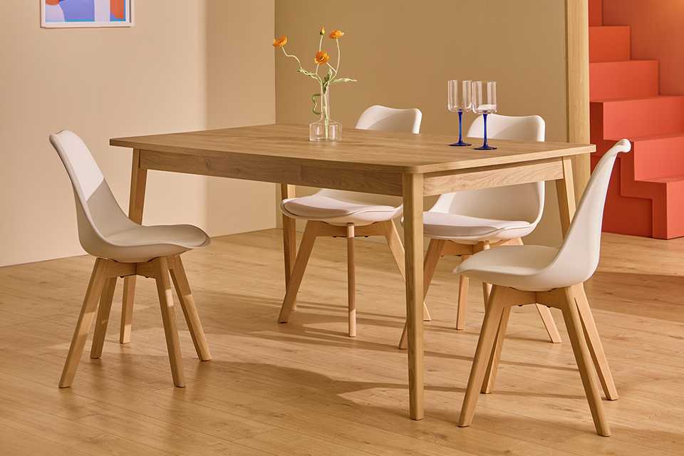Habitat Sylas Solid Wood 4 Seater Dining Table in natural finish.