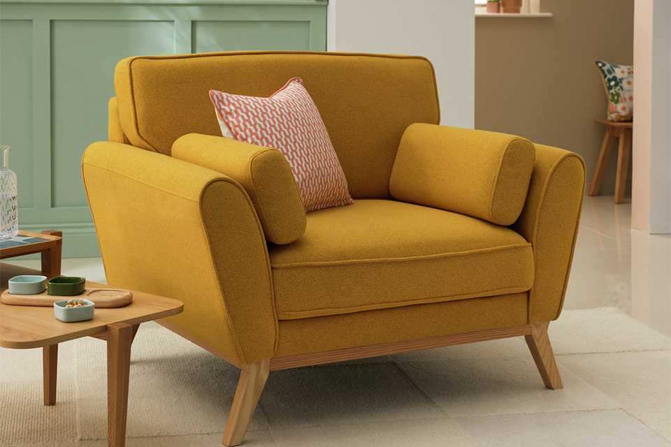 Lohko fabric armchair in yellow.