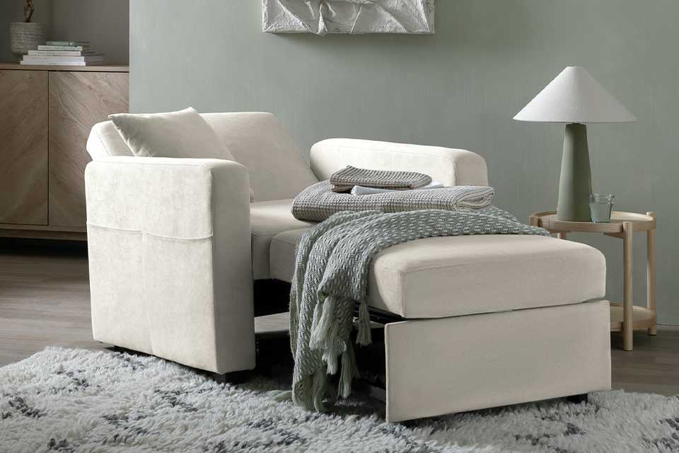 Reagan single chairbed in natural fabric.