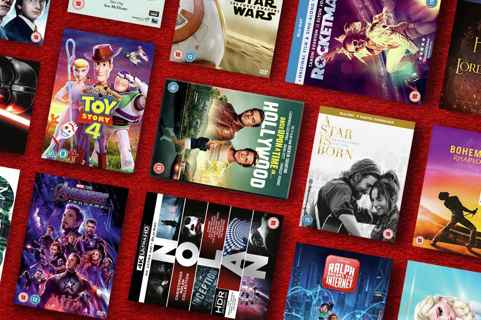 A variety of DVDs displayed with a red background.