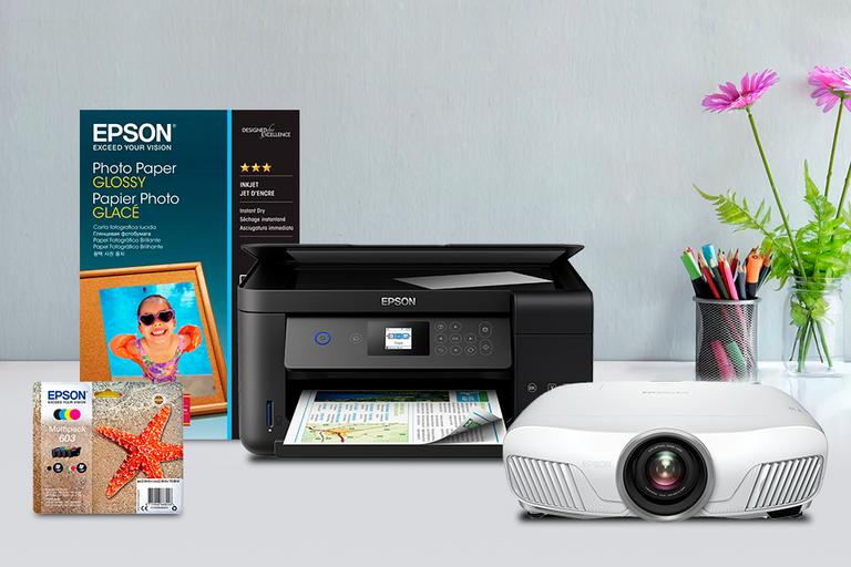 Epson printer, paper, ink and projector.