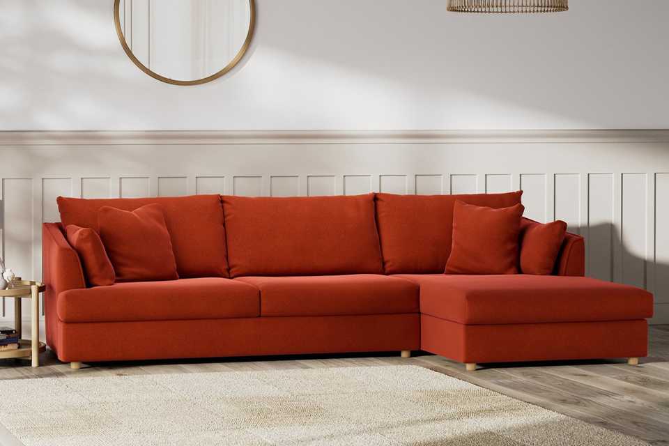 Orange made to order sofa by Habitat.