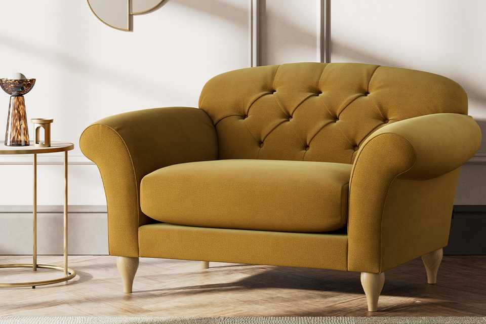 Habitat made to order mustard velvet armchair in living room.