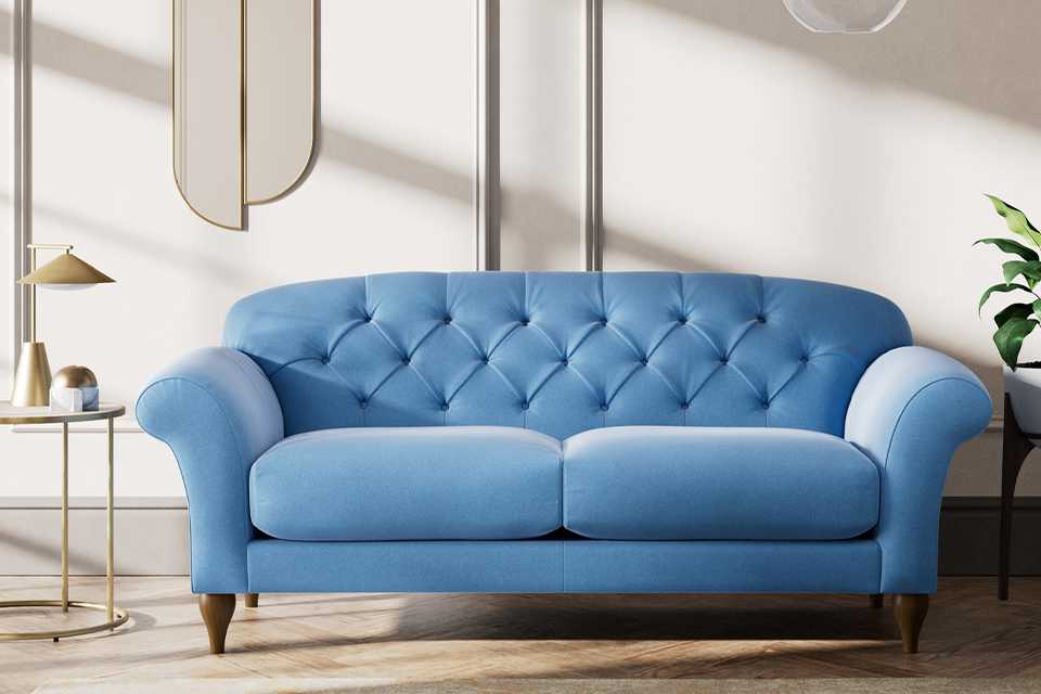 Blue velvet made to order sofa.