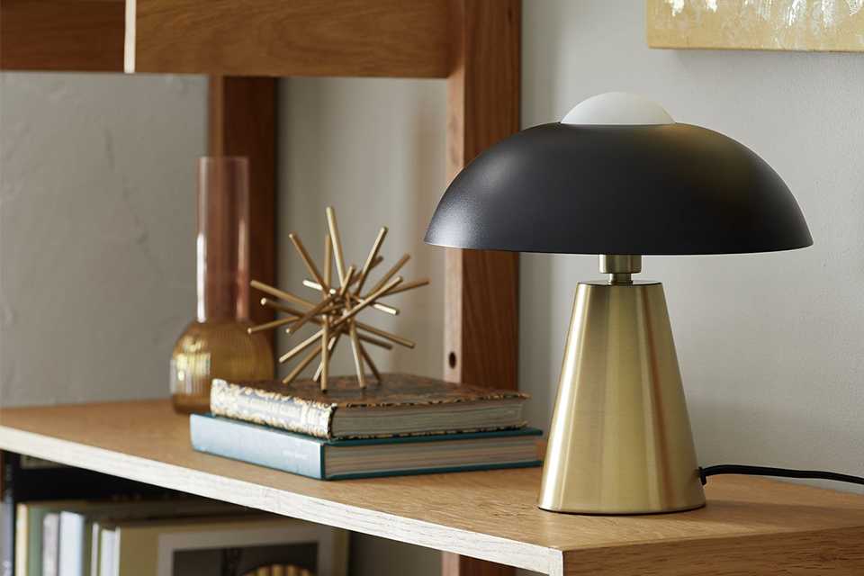 Gold accessories on side board.