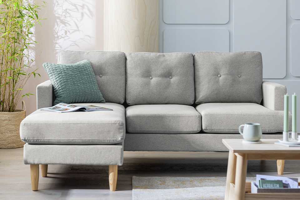 Joshua compact corner chaise in light grey.
