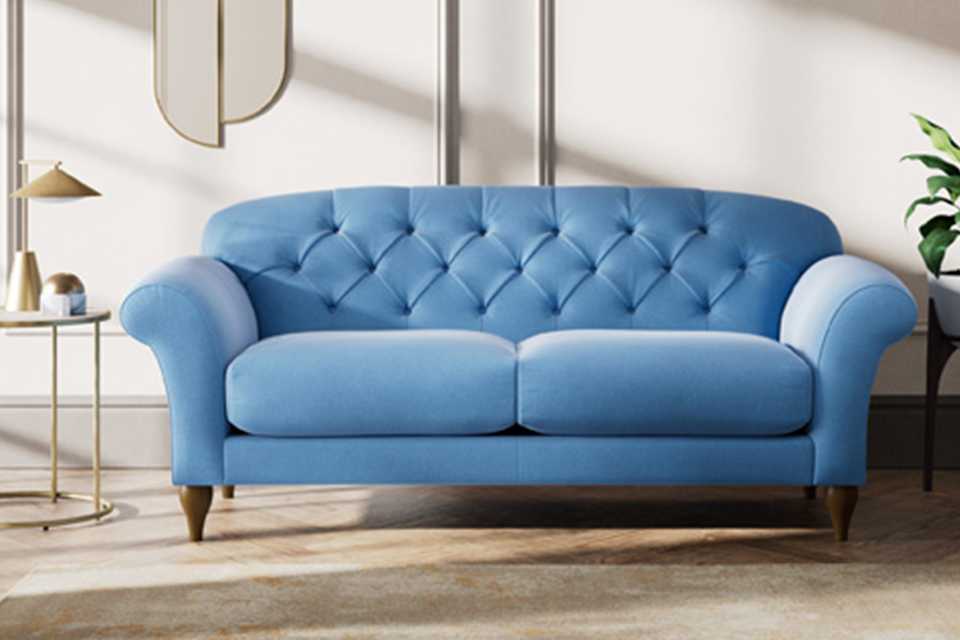 Blue velvet made to order sofa.
