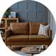 Argos leather 2 seater sofa in tan.