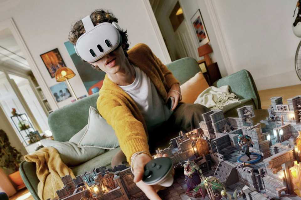 A person using Meta Quest 3 512GB All-In-One Mixed Reality Headset.
