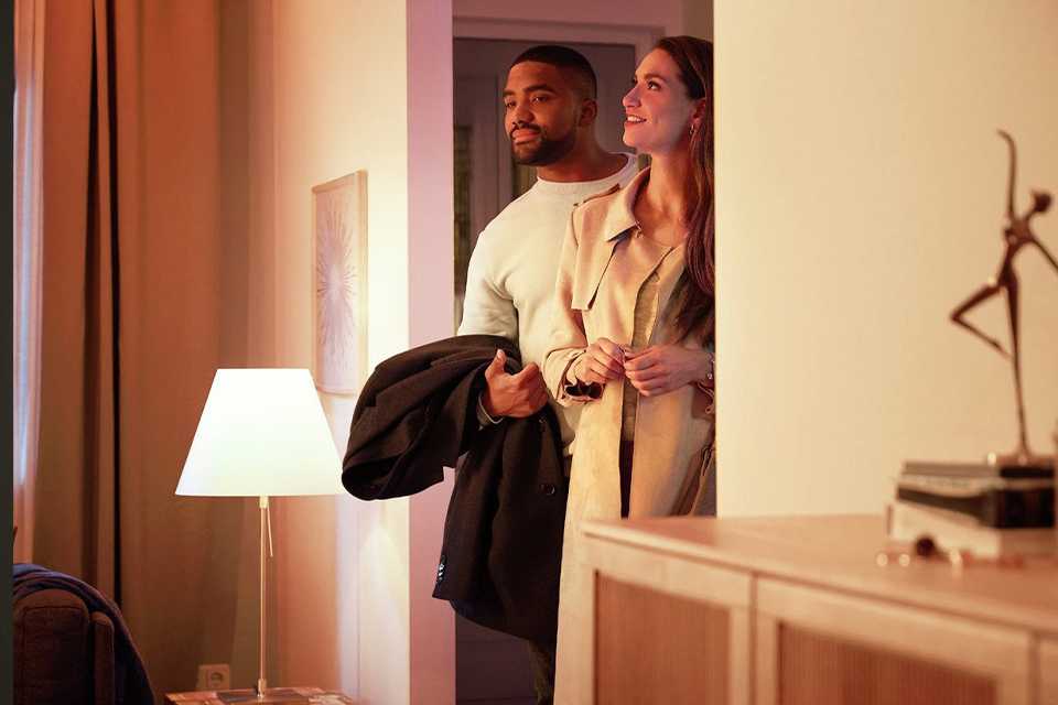 A room lit up with Phillips Hue white GU10 4.2 W smart light bulbs.