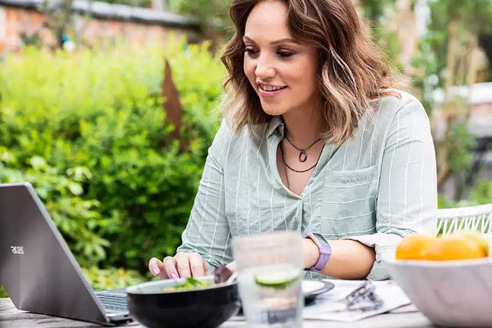 A woman using her laptop.