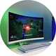 Philips Evnia 34M2C5501A 34 Inch 180Hz QHD Gaming Monitor set up on a white gaming desk.