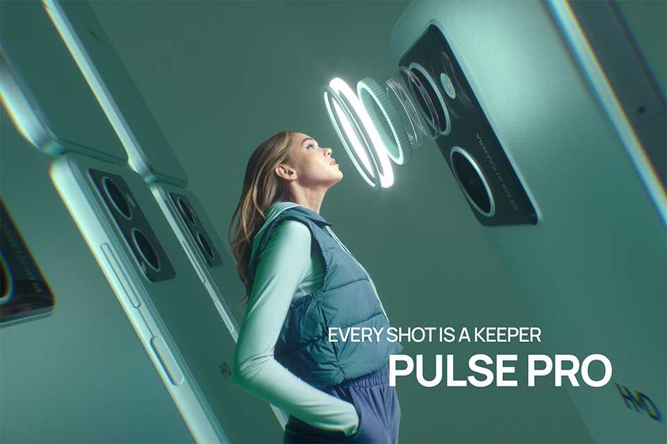 A girl looking into the camera of a green HMD Pulse Pro smartphone.