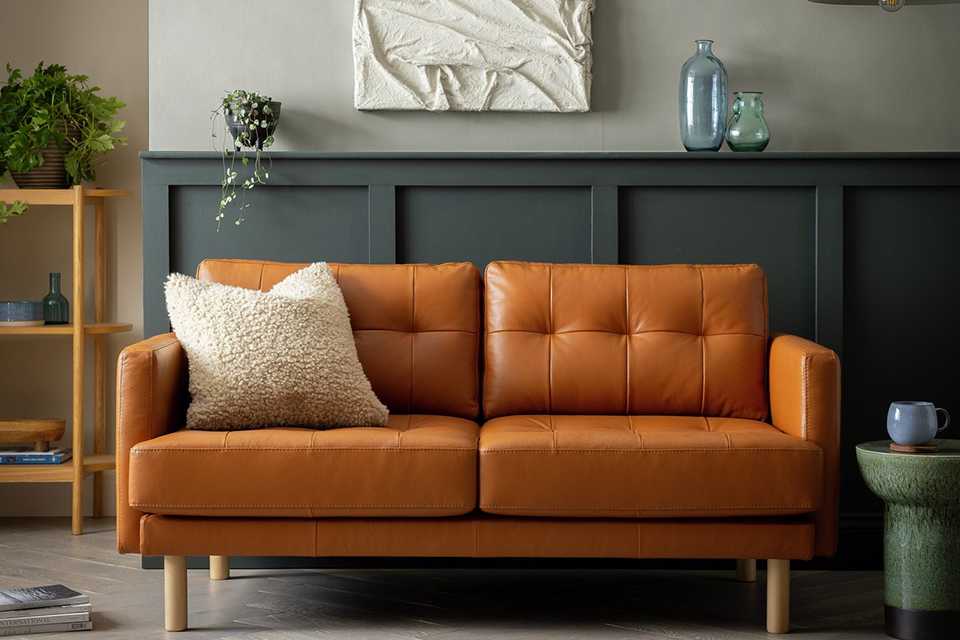 A Habitat leather 2-seater sofa in tan.