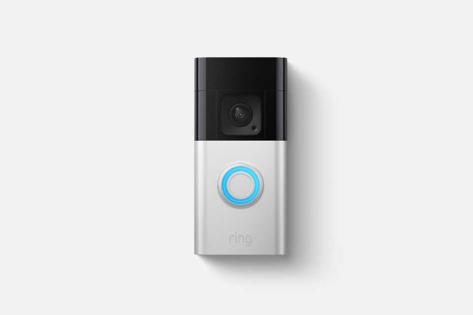 A Ring Battery Video Doorbell Plus against a black background.