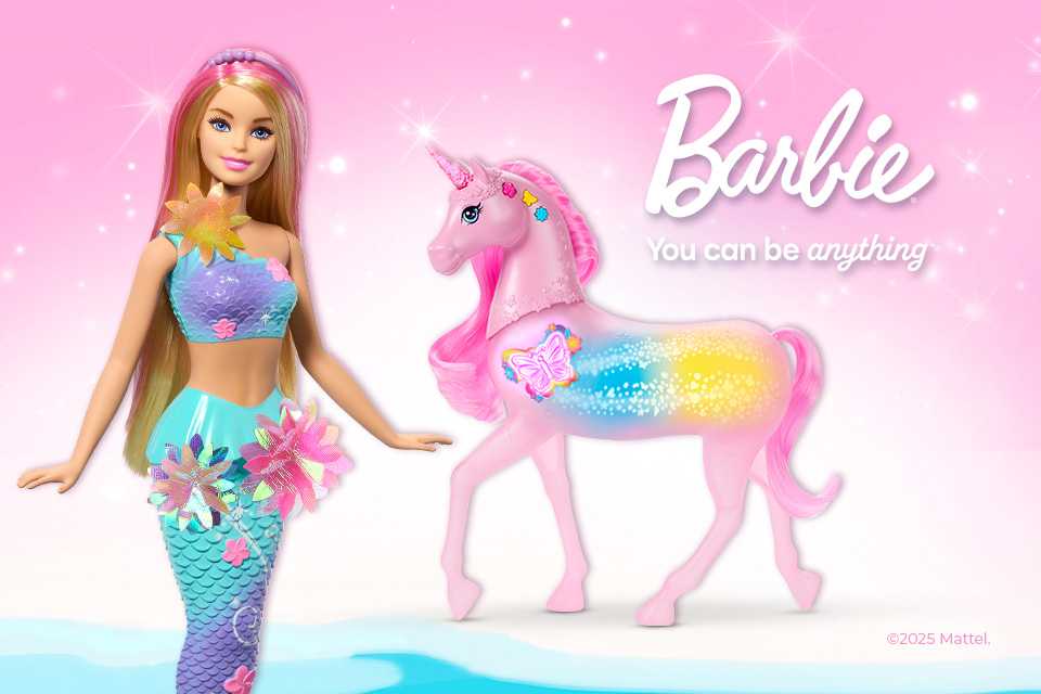 A Barbie doll and a unicorn doll against a light pink background.