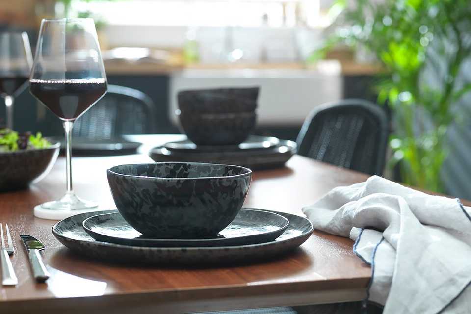black glazed stoneware 12 piece dinner set.
