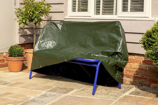 set image of furniture in a garden covered up